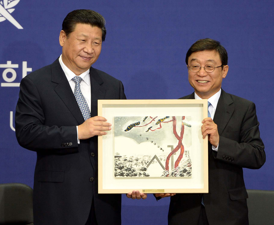 习近平会见韩国国会议长禹元植